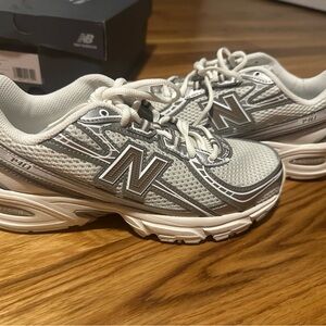 New Balance White and Silver Athletic Shoes